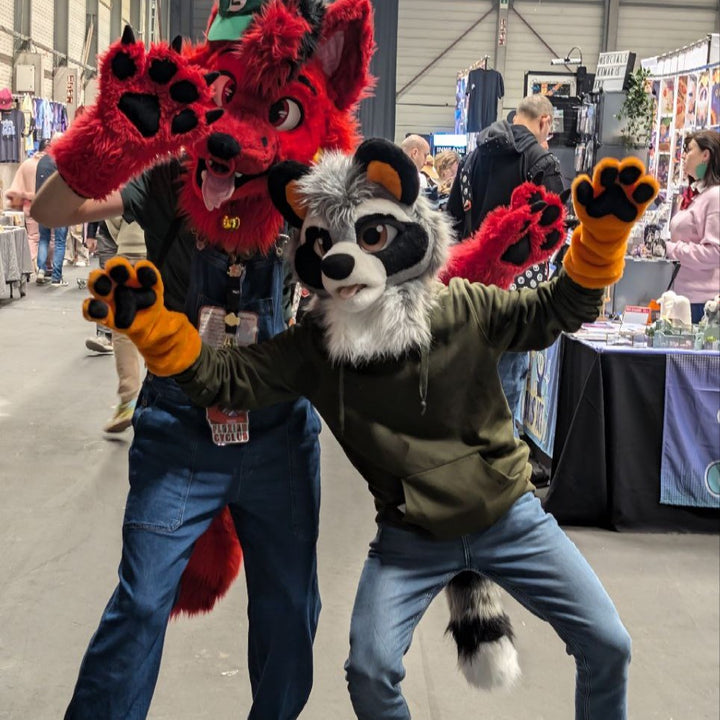 Orange raccoon fursuit head, hand paws and tail
