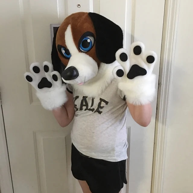kid wearing beagle fursuit  head and hand paws 
