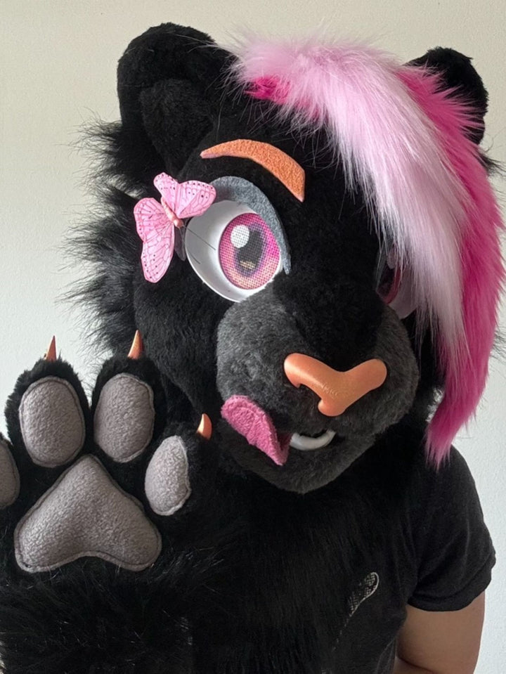 Posable tongue removable on velcro