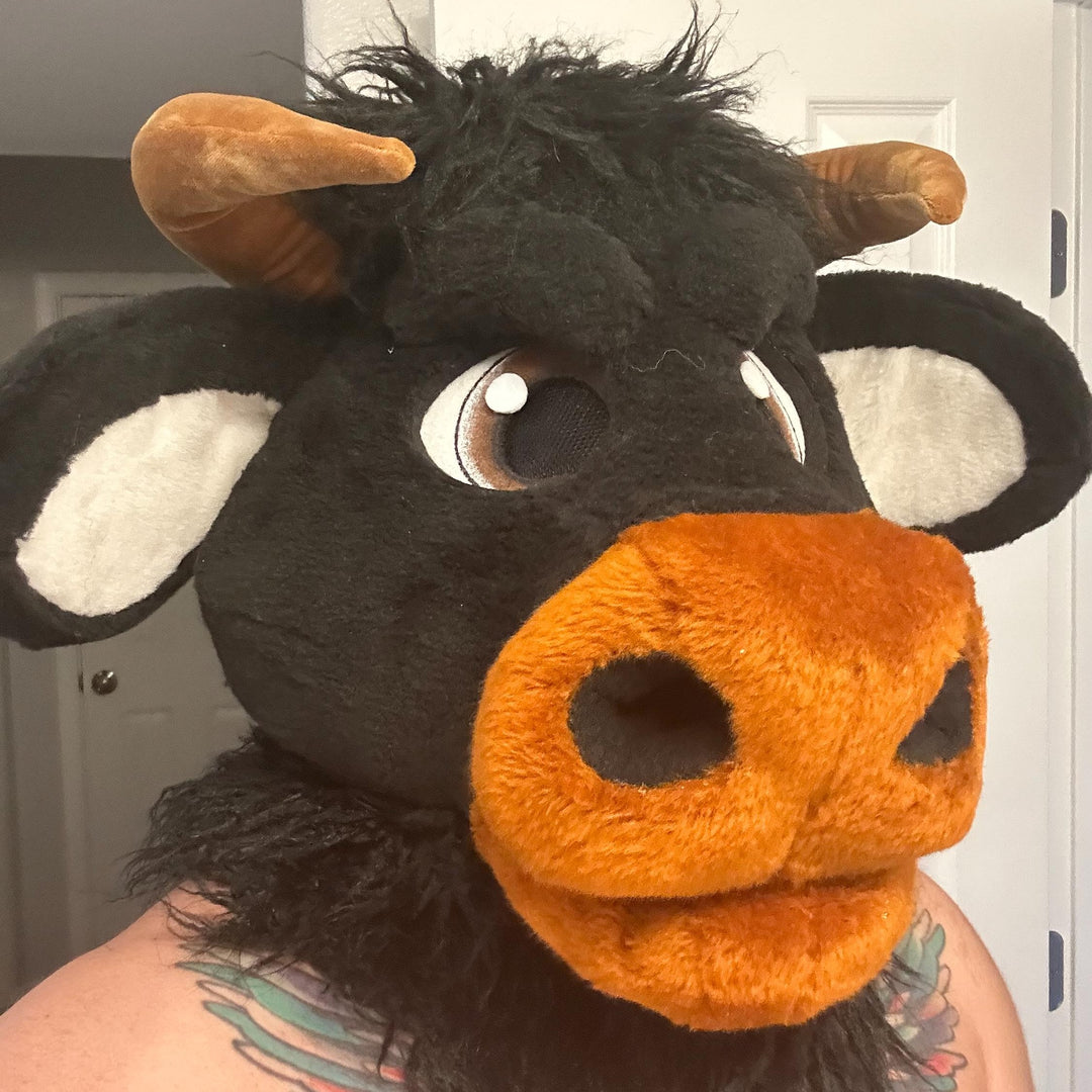 Black bull furry head with horns
