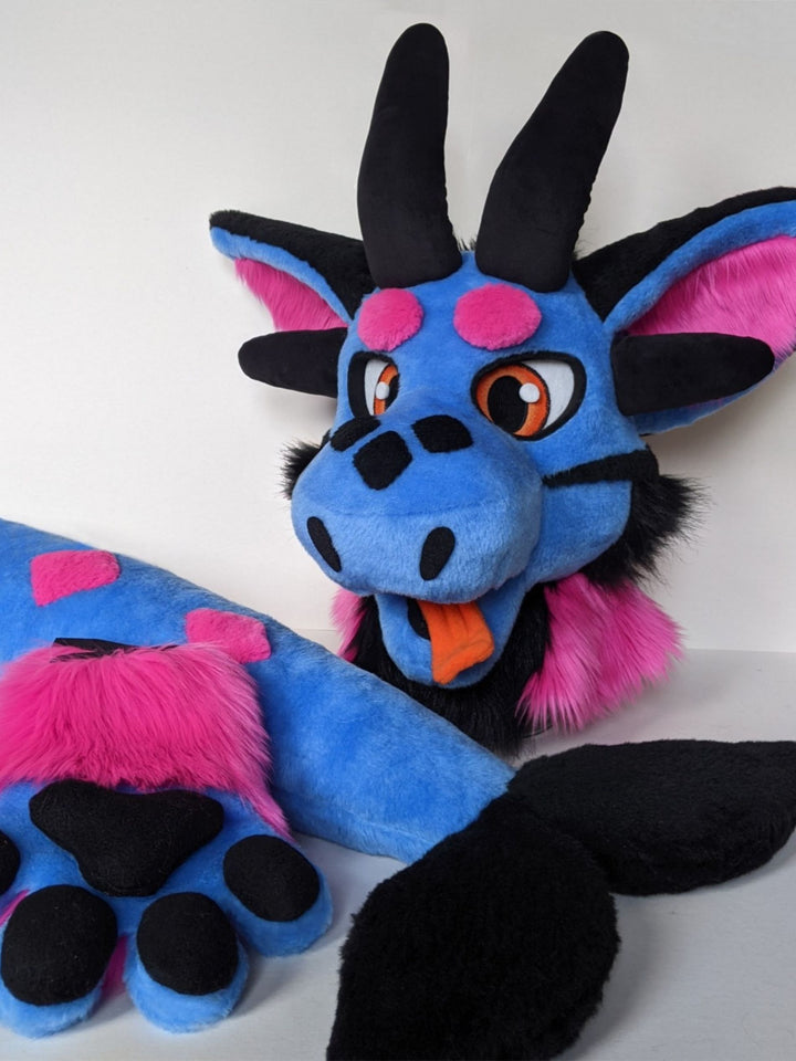 Posable tongue removable on velcro