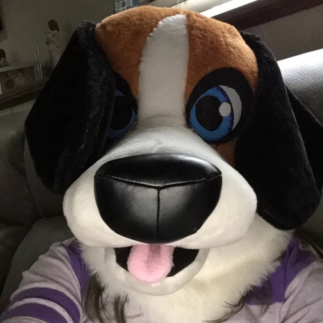 Kid wearing beagle dog fursuit head