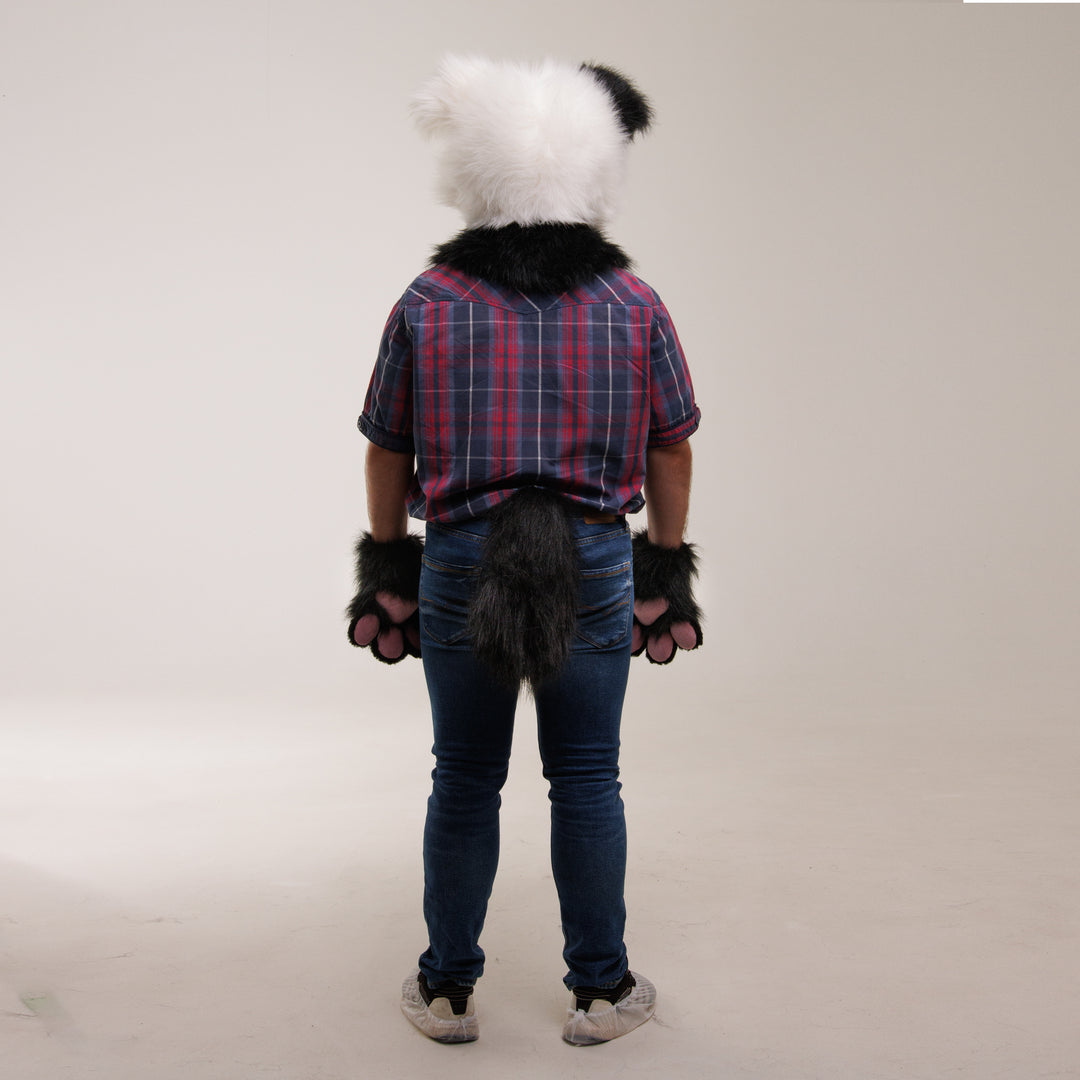 A person wearing border collie fursuit back view