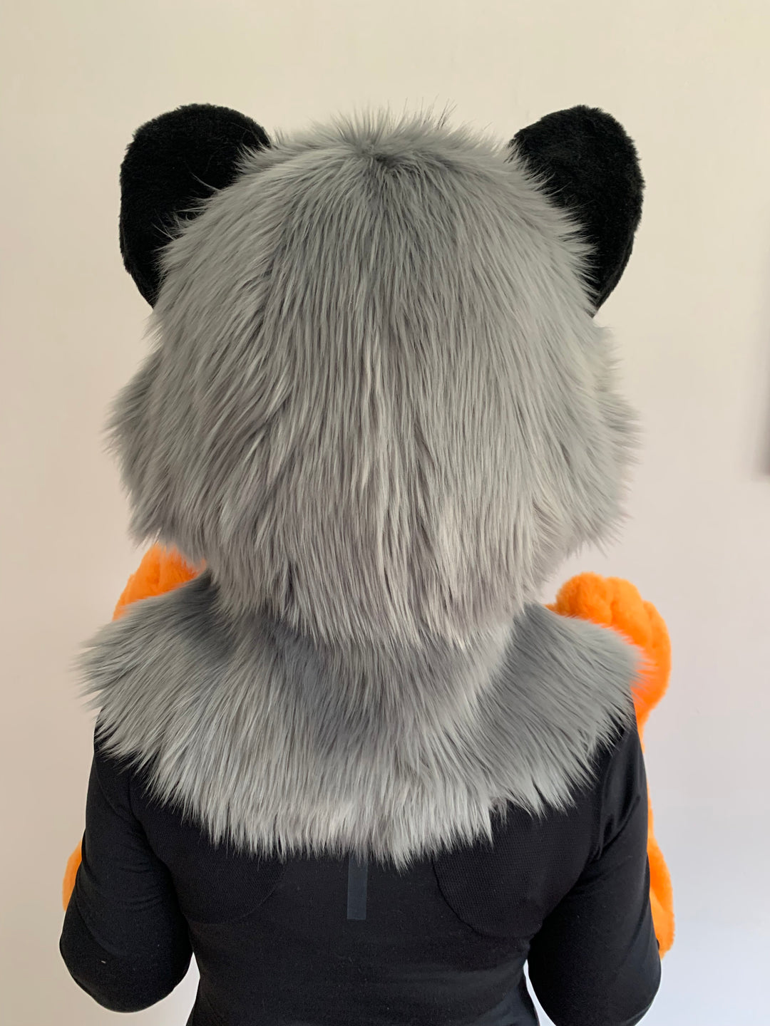 Orange raccoon fursuit head, hand paws and tail